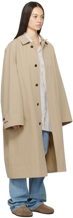 Washed cotton poplin trench coat. · Button fastening at spread collar · Concealed button closure · Welt pockets · Raglan sleeves · Adjustable button tab at cuffs · Horn hardware Supplier color: Light taupe Gabardine Button-up Outerwear With Button Cuffs, Classic Outerwear With Button Cuffs, Classic Outerwear With Button Cuffs For Daywear, Buttoned Gabardine Outerwear, Mac Coat, Studio Nicholson, Cotton Coat, Cotton Poplin, Welt Pocket