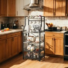 a kitchen filled with lots of wooden cabinets and counter top space next to an oven