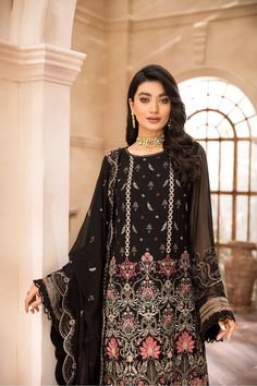 Black Salwar Kameez with Intricate Embroidery a beautifully made Pakistani Dress with breathtaking details on it. This Pakistani Party Wear coomes with trendy embroidered patterns on it making it even more enchanting. This dress is highly eye-catching and it wins hearts at very first sight. Kameez: This Black Salwar Kameez comes with a beautifully made Long Kameez in premium quality chiffon. This kameez is decorated with very delicate embroidered patterns on it making this dress look even more s Black Salwar, Long Kameez, Black Salwar Kameez, Embroidered Patterns, Pakistani Party Wear, Page 404, Chiffon Collection, Pakistani Dress, Silk Trousers