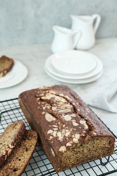 a loaf of bread sitting on top of a cooling rack