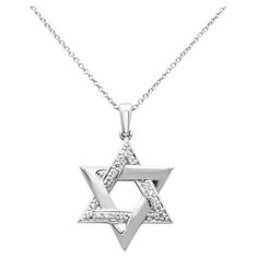 A simple Star of David pendant made in 18K White Gold accented with round diamonds weighing 0.30 carats total, F color and VS in clarity. Suspended on an 18 inch chain. Perfect for your everyday use. Roman Malakov is a custom house, specializing in creating anything you can imagine. If you would like to receive a special quote on a custom piece please message or call us. Simple Pendant Necklace, The Star Of David, Round Star, Simple Pendant, Pendant Necklace Simple, Star David, Star Of David Pendant, White Gold Chains, Custom House