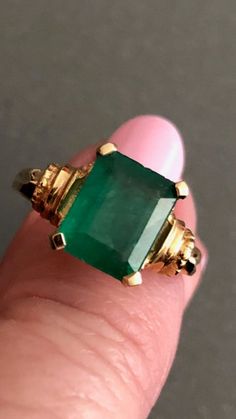 Gorgeous Vintage 2 Carats EMERALD Set on 14K Yellow Gold Ring Size 5 1/4 US Estate piece Certificate of Appraisal included  A beautiful gift for that special someone! Comes in a leatherette gift box Chunky Emerald Ring, Antique Emerald Ring Vintage, Art Deco Gia Certified Emerald Ring As Gift, Gia Certified Art Deco Emerald Ring Gift, Vintage Gia Certified Gold Emerald Ring, 14k Gold Jewelry With Certificate Of Authenticity For Anniversary, Classic 14k Stamped Emerald Cut Emerald Ring, Classic Collectible Emerald Ring, Gia Certified Rectangular Emerald Ring For Anniversary