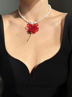 Baroque pearl necklace with red rose beaded flower. Delicately made by hand. Flower pendant hand made with faceted swarovski and Czech beads.  Pendant height: 6 cm / 2.36 inches. Pendant width: 3.5 cm / 1.37 inches. Freshwater and baroque pearls. Necklace length: 39 cm / 15.35 inches + 3 cm / 1.18 inches extension chain. Golden stainless steel lobster claw closure. Packaging I wish that the opening of your parcel became a real moment of pleasure for you so I take care to pack each order thorough Red Pearl Necklaces For Valentine's Day, Red Beaded Flower Shaped Jewelry, Red Flower-shaped Beaded Necklaces For Gifts, Red Flower-shaped Beaded Necklace For Gift, Elegant Red Flower Charm Necklace, Elegant Red Flower Necklace With Charm, Pearl Beaded Flower Necklace For Gift, Baroque Pearls Necklace, Hand Flower