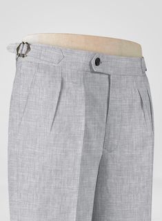 Maintain a distinct professional appearance by adding an extra bit of flair with our Italian Zod Light Gray Linen Trousers. Crafted from linen, these pants will keep you cool, sharp and stylish in summer.    Look Includes   Italian Zod Light Gray Linen Fabric  Cross Pocket  Forward 2 Pleats  Side Tabs (No Loops)- Arrow Shape  Bottom Cuff (1.5")   Two Welted Back Pockets on Trousers    Click 'Customize Now' to modify the look if needed.    Lining: Viscose, Dry Clean. White Linen Suit, Harris Tweed Fabric, Light Grey Suits, Fabric Cross, Scottish Fashion, Professional Appearance, Linen Suits, Herringbone Tweed, Brown Suits