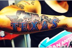 a man with a texas tattoo on his arm