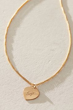 Just as effortless as it is elegant, this stunning necklace features a heart-shaped pendant with gorgeous cursive engraved initial for the ideal finishing touch. * 14k Gold Filled wheat chain * Personalized, laser engraved, 14k Gold Filled 12x14mm heart charm * Length: 18" * 5 days of production | Set & Stones Personalized Alice Necklace at Free People in Gold Engraved Initials, Stunning Necklace, Gold Pendant Necklace, Heart Charm, Gold Pendant, Boho Outfits, Laser Engraving, Free People, Gold Filled