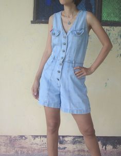 faded romper Vintage 80s JouJou jumpsuit size M, blue Jeans Romper, Denim Shorts Romper, Sleeveless Romper,hipster, cool jeans I want you to experience the beauty, style and comfort of my goods. condition : vintage good ( Rare ) color : Blue jeans Material : Denim fabric Label : jou jou size M ,W27 - 29 for women Please refer to the pictures for more details. / I check measurements centimeters or inches 1. bust up to 37 inch // 94 cm. 2. Waist: 27 or 29 inch // 68.5 or 73.7 cm 3. Hips: up 40 inc Casual Blue Sleeveless Shortalls, Casual Sleeveless Medium Wash Shortalls, Casual Medium Wash Sleeveless Shortalls, Sleeveless Denim Jumpsuit With Buttons, Denim Overall Jumpsuit With Buttons For Summer, Summer Denim Overalls Jumpsuit With Buttons, Summer Denim Overalls With Buttons, Blue Denim Sleeveless Shortalls, Sleeveless Denim Blue Shortalls