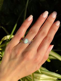 Ethiopian Opal Oval Ring For Wedding, Adjustable Opal Ring Jewelry, Stackable Opal Promise Ring, White Opal Ring With Round Cut, Diamond White Round Opal Jewelry, White Round Cut Opal Ring, White Solitaire Opal Ring Fine Jewelry, Adjustable White Gold Opal Ring, Fine Jewelry Stackable Opal Promise Ring