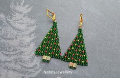 Christmas tree earrings Earrings length: 1.96 inches / 5 cm. Earrings width 1.37 inches / 3.5 cm RECOMMENDATION FOR USE AND CARE: - Store your handmade jewelry in a sealed box out of direct sunlight. - Do not clean with water or any other liquid. - Do not give them to small children. - Don't drop them. - Carefully put on and take off. PACKAGING: When you buy these earrings, you receive them in a gift paper bag making them the perfect gift. Colors may vary depending on your screen resolution and Christmas Gift Earrings, Earrings Triangle, Holiday Beading, Winter Earrings, Christmas Party Gift, Tree Earrings, Holiday Earrings, Christmas Tree Earrings, Christmas Bead