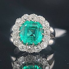 GORGEOUS platinum Vintage engagement ring natural colombia emerald ring circ 1930's  center Natural green emerald in emerald shape weight 3.02ct. size 8.6x8.5mm AGL CERT  nice rich green color , clean, very lively ,very brilliant ,amazing  cut .  side  natural old mine cut diamonds weight  1.75ct  SI1-H ring size 5 Resizable  1old ring in a very good condition.  Retail value $29,500 net.  Appraisal available Platinum Emerald Ring In White Gold, Art Deco Emerald Ring In Platinum, Art Deco Platinum Emerald Ring, Platinum Emerald Cut Ring With 17 Jewels, Green Platinum Cluster Ring For Formal Occasions, Classic Green Platinum Ring, Classic Green Platinum Rings, Green Octagon Platinum Ring, Platinum Green Gemstone Rings