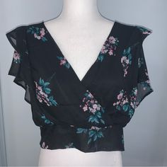 Code X Mode Floral Vneck Blouse Nwt Size Large Flutter Sleeves Elastic Band Waist Deep V (Has Snap But Has Come Off On One Side- See Pic) Cris Cross Open Back Pit To Pit 20” Length 20” 465 Chic Floral Print V-neck Top, Elegant Floral Print V-neck Top, Elegant V-neck Floral Print Tops, Summer V-neck Blouse For Date Night, Black V-neck Summer Blouse, Flowy V-neck Feminine Tops, Casual V-neck Blouse For Date Night, Black V-neck Top For Spring, Feminine Black V-neck Blouse