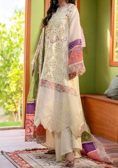 Introducing our Luxury collection'Luxury Lawn-24' by Maryum N Maria designed to make you look and feel your best. These pieces will add a touch of class and elegance to your wardrobe. This collection is a beautiful collection of ensembles offering versatile compositions for the latest festive wardrobe requirements. Chikankari Lawn Right, Left, and Centre Shirt Panel. Chikankari Organza Shirt Boders. Embroidered Organza Front, Back, and Sleeves Patti. Embroidered Chiffon Dupatta With Multi Colour Organza Pallu Patti Patch. Dyed Lawn Palazzo. Color: There might be slight color variation due to lighting and flashes while the photo shooting. The color may also vary because of different screen resolutions. Wash Care: Dry Clean Only. Elegant Beige Georgette Sets, Elegant Off White Georgette Dresses, Elegant Designer Cream Dresses, Elegant Cream Designer Dresses, Elegant Multicolor Sets With Resham Embroidery, Elegant Chikankari Embroidery Sets For Spring, Designer Cream Dress With Intricate Embroidery, Elegant Designer Beige Sets, Elegant Semi-stitched Off White Dress