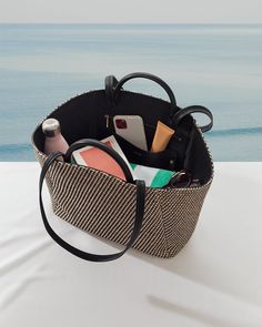 A vacation-ready tote to perfectly capture the summer spirits and bring a sophisticated touch to your seaside looks, crafted from Italian woven viscose and finished with smooth Italian leather details. It’s perfectly sized for your essentials—towel, swimsuit, coverup, sunscreen, and your next beach read. Tote Insert, Beach Read, Travel Capsule, Better Things, Beach Reading, Beach Ready, Monogrammed Items, Summer Adventures, Work Bags