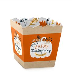 an orange and white paper bag that says happy thanksgiving