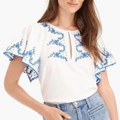 J. Crew Womens Flutter Sleeve V-Neck Embroidered Top Blouse Size Xs White Description: Condition: New With Tags Brand: J. Crew Size: Xs Color: White/Blue Embroidered V-Neckline Flutter Sleeve Imported Chic Blue Tops With Floral Embroidery, V-neck Tops With Floral Embroidery For Brunch, V-neck Top With Floral Embroidery For Brunch, Floral Embroidered V-neck Top For Brunch, Embroidered Short Sleeve Blouse For Brunch, Casual Embroidered Top For Brunch, Casual Embroidered Top With Flutter Sleeves, Casual Embroidered Flutter Sleeve Top, Spring Embroidered Tops With Flutter Sleeves