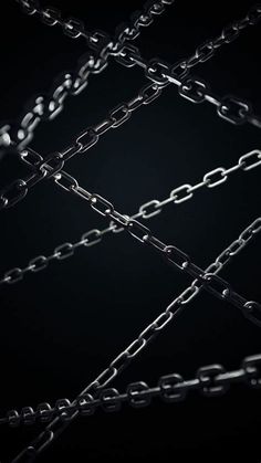 an abstract photo of chains on a black background