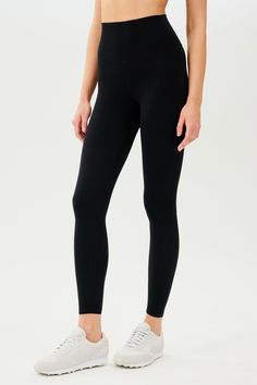 An all new extra waist version of our high waist Airweight legging engineered to fit every curve and flow with your workouts. Our ultra luxe Airweight fabric has a supremely soft hand and second skin comfort. BEST FOR: hot yoga, barre, Pilates. Model is 5’10” and wears a size small. Compressive High-rise Activewear With Wide Waistband, Compressive High Rise Activewear With Wide Waistband, High Rise Compressive Activewear With Wide Waistband, Black High Stretch Yoga Pants, Black High-stretch Yoga Pants, Compressive Functional Tights For Yoga, Compression Activewear With Wide Waistband For Pilates, Compressive Solid Bottoms For Barre, Black Yoga Pants For Pilates