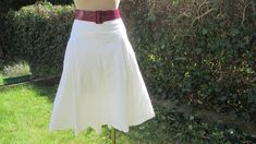 "This pretty skirt is perfect for spring, autumn and summer! DETAILS: summer skirt fabric: cotton color: white skirt with lining side zipper skirt with embroidery Very good vtg condition. Measurements lying flat are: Length: 25\" / 63,5cm Waist: 18\" / 45,7 cm PLEASE NOTE: \"Laying flat\" means that  \"waist\" NEED TO DOUBLED Estimated size: EUR44 UK16, but refer to measurements. Belt and blouse in photo are not included" Summer Cotton Lined Skirt, Summer Full Skirt Cotton Bottoms, Summer Cotton Full Skirt Bottoms, Vintage White Gathered Skirt Bottoms, Summer Full Skirt Bottoms In Cotton, Relaxed Full Cotton Skirt, Cotton Skirt For Summer Day Out, Cotton Gathered Skirt For Day Out, Relaxed Fit Full Cotton Skirt