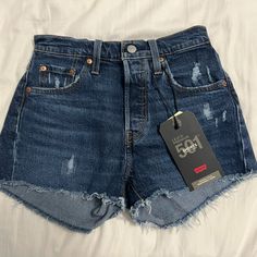 Levi’s Dark Wash High Rise Shorts. Size 25. Brand New With Tag Levi's Dark Wash Summer Shorts, Levi's High Waist Summer Bottoms, Levi's Summer Bottoms With Pockets, Levi's High Waist Summer Shorts, Summer Levi's Bottoms, Levi's High Rise Shorts With Pockets, Levi's High Waist Shorts With Pockets, Levi's High Rise Summer Bottoms, Levi's Short Bottoms With Built-in Shorts