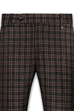 Elevate your ensemble with the Ferra Brown and Black Plaid Tweed Pant. The classic plaid pattern meets the rustic charm of tweed, adding depth and texture to your look. Whether it's a formal affair or a stylish gathering, this pant adds a touch of timeless sophistication that's sure to turn heads. Embrace a look that's both classic and distinguished. In addition to being constructed from Imported Superior Fabrics, French crown Pants are built with top quality components and thoughtful constructi Fall Tweed Trousers, Business Casual Tweed Pants With Herringbone Pattern, Tailored Tweed Pants For Fall, Formal Tweed Pants For Fall, Fall Fitted Tweed Pants, Fitted Tweed Pants For Fall, Elegant Tweed Pants For Winter, Classic Tweed Bottoms For Fall, Tweed Bottoms For Business Casual In Fall