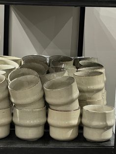 a bunch of cups that are stacked on top of each other