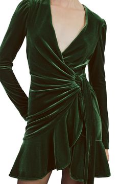 Gorgeous stretch velvet brings elevated texture to this party-approved faux-wrap mini featuring a cinching tie at the waist and a flouncy hem. 34 1/2" length (size 8) Hidden back-zip closure Surplice V-neck Long sleeves Attached waist tie Partially lined 95% polyester, 5% elastane Dry clean or hand wash, line dry Imported Short Emerald Green Dress, Holiday Cocktail Dress, Long Sleeve Dresses Fall, Chic Cocktail Dress, Green Cocktail Dress, Velvet Cocktail Dress, Day To Night Dresses, Long Sleeve Cocktail Dress, Stretch Velvet