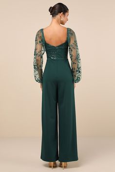 You'll strut your way into everyone's heart in the Lulus Darling Charisma Emerald Mesh Embroidered Jumpsuit! Elegant floral-embroidered mesh shapes a sweetheart neckline (with hidden no-slip strips) and long, sheer balloon sleeves (with elasticized shoulders and cuffs) that can be styled on or off the shoulders. The high, fitted waist tops crepe knit pants with a wide-leg silhouette and full-length hems. Hidden back zipper/clasp. Fit: This garment fits true to size. Length: Floor length. Size me Elegant Embroidered Jumpsuits And Rompers For Party, Emerald Jumpsuit, Emerald Green Jumpsuit, Embroidery Jumpsuit, Prom Jumpsuit, Black Backless Jumpsuits, Wedding Pantsuit, Embroidered Jumpsuit, Off Shoulder Jumpsuit