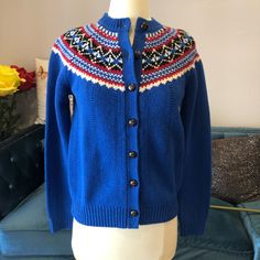 Beautiful Wool Sweater Size Xs New Without Tags Blue Indigo Color With Red And White Accents 100% Wool Casual Blue Sweater With Fair Isle Pattern, Casual Blue Fair Isle Sweater, Blue Fair Isle Pattern Outerwear For Fall, Blue Fair Isle Pattern Fall Outerwear, Blue Fair Isle Outerwear For Fall, Embroidered Blue Sweater For Fall, Blue Embroidered Sweater For Fall, Blue Long Sleeve Outerwear With Fair Isle Pattern, Blue Embroidered Winter Sweater