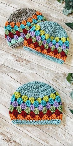 two crocheted hats sitting on top of a wooden table