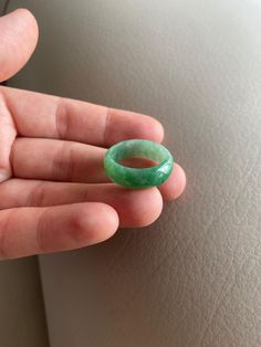 🌈 US 7 3/4 Jadeite Jade Ring, Light Green 🌷 Untreated Natural Jadeite Jade/ Grade A Jade 🌷 Certified : YES 🌷 Jade from Myanmar/ Burma 🌷 Width & Thickness : 7.5mm & 2.9mm 🌷 Sizing Ring : US7 3/4 🌷 Color : Light Green 🌷 Free standard shipping from Hong Kong with tracking included 🌷 Take approximately 7-21 days to arrive worldwide Round Emerald Jewelry For Healing, Handmade Green Jade Rings, Green Jade Round Band Jewelry, Traditional Green Oval Emerald Ring, Green Jade Rings With Natural Stones, Green Natural Stones Ring, Green Rings With Natural Stones In Fine Jewelry, Green Rings With Natural Stones, Round Green Emerald Gemstones