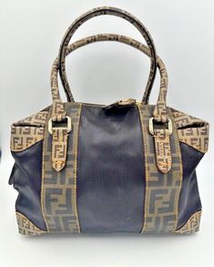 Fendi, This is a beautiful bag with no visible signs of wear; must see pics.   We always exceed our customers expectations. All of our designer listings are 100% authentic and thoroughly examined.   We provide as much detail as possible.  We will answer any question about our products within 24 hours. Thank you for your interest,