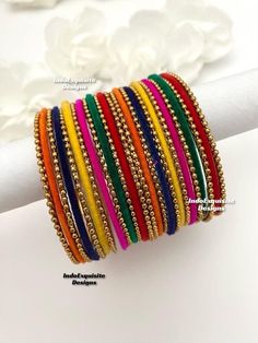 Multi color bangles set/Rainbow bangles/ Bangles Indian Wedding jewelry/ Indian Bangles All items are shipped from Brampton, Ontario, Canada. If you need your item by a certain day, please reach out to us for express delivery option before placing the order so that we can update the shipping for you. Standard shipping/delivery timeline Below are the estimated delivery times after the order is shipped/dispatched.  ---> USA delivery timeline * 3-5  business days to major urban centers in USA. It may take 2-3 days extra to remote locations ---> Canada delivery timeline  * 2-3 business days - GTA  & Montreal  * 2-4  business days - Rest of Ontario/Quebec * 4-6 business days-  Rest of Canada (Please consider 1-2 extra business days to very remote locations)    ---> Europe/Middle East timeline * Multi Color Jewelry, Bohemian Multicolor Beaded Bracelets For Weddings, Multicolor Beaded Bangle Bracelets For Wedding, Adjustable Multicolor Beaded Bracelets For Wedding, Handmade Multicolor Bangle For Wedding, Adjustable Multicolor Wedding Bracelet, Bohemian Multicolor Bangle For Wedding, Handmade Multicolor Wedding Bangle, Elegant Multicolor Beaded Bracelets For Wedding