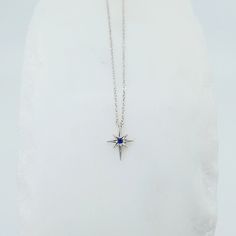 The 8-point star symbolizes redemption or rebirth. The star on this celestial necklace is accented by a single blue sapphire in the center. We find that the sterling silver version with the blue sapphire gives it a beautiful vintage look. Details: Sterling silver Star is about 10mm X 8mm Blue sapphire is about 1.6mm Necklace Chain measures 16 inches Free Shipping on Domestic Orders Materials: Sapphire, sterling silver, blue sapphire Sapphire Necklace Simple, Silver Sapphire Necklace, Blue Sapphire Necklace, Star Necklace Silver, Celestial Necklace, Necklace For Girlfriend, Dope Jewelry, Jewelry Lookbook, Star Jewelry