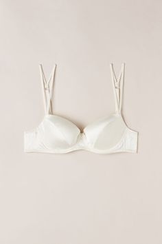 Embrace your beauty

The snug underwire and padded cups provide optimal support, while adjustable double braided straps add an elegant touch. Designed to enhance your décolleté with a sensual and refined silhouette, it's time to embrace the allure of silk and shine with confidence. Elegant Bra With Removable Pads And Adjustable Fit, Elegant Adjustable Bra With Removable Pads, Classic Padded Bra, Underwire Bra With Delicate Straps, Cream Push-up Bra With Built-in Support, Elegant Adjustable Straps, Cream Underwire Bra With Removable Pads, Classic Padded Push-up Bra, Elegant Strappy Bra With Removable Pads