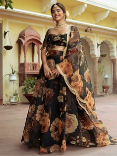 Introducing the beautiful black floral printed organza event wear lehenga choli, the perfect outfit for festivals, events, and receptions. This stunning black lehenga is made from high-quality organza tebi material, adorned with exquisite floral printed work. Its elegant design and intricate details make it a must-have for any special occasion.
The lehenga features a semi-stitched design, allowing for a comfortable fit of up to 42 inches. With a 4.0-meter flair, it exudes grace and elegance with Floral Lengha, Golden Lehenga, Lehenga Choli Designs, Indo Western Gown, Lehenga Choli For Women, Choli For Women, Printed Organza, Organza Lehenga, Black Lehenga