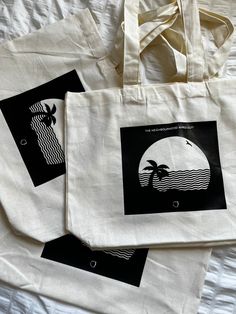 The Neighbourhood Wiped Out Tote Bag 100% cotton bag with black vinyl design🖤 *Tote Bag Measurements:   -17 Inches x 13.5 Inches  -Bag Handles: 11 Inches  -Bag width: 4 Inches (see 3rd picture) Black Cotton Canvas Bag For Weekend, Black Cotton Bag With Graphic Print, White Screen Print Bags For Everyday Use, The Neighbourhood Merch, Desain Tote Bag, Totes Ideas, Tods Bag, Vinyl Bag, Design Tote Bag