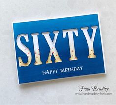 a happy birthday card with the word sixty on it's blue and white background