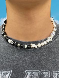 The 'YIN & YANG' half black, half white freshwater pearl necklace is what you've been waiting for - perfect for those who are looking to dress up any outfit with jewelry! No matter how this necklace is styled, the 'YIN & YANG' will get heads turning, guaranteed. Made with lamp work charms & freshwater pearls. Waterproof and rust-free. Available in lengths 14", 15", 16", 18", 20". Model is wearing 15". Handmade in Los Angeles. Pola Manik, Beaded Necklace Designs, Pola Gelang, Gelang Manik, Dope Jewelry, Funky Jewelry, Jewelry Lookbook, Freshwater Pearl Necklace, Creating Jewelry