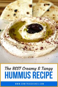 hummus with olives and pita bread on the side, text reads the best creamy & tangy hummus recipe