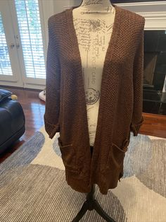 Before You Brown Long Cardigan Size M/L. Brown Long Sleeve Cotton Cardigan, Brown Cotton Cardigan, Casual Brown Cotton Cardigan, Brown Cotton Sweater For Spring, Brown Cotton Cardigan For Winter, Brown Knit Sweater Coat For Layering, Oversized Brown Cotton Cardigan, Casual Long Cotton Sweater, Trendy Long Brown Cardigan