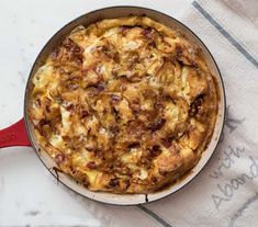 a casserole with meat and cheese in a pan