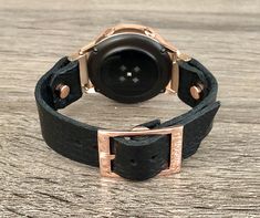 High Quality Grain Genuine Leather Strap Band Compatible with : Galaxy Watch (42mm) | Galaxy Watch Active | Watch Active2 (40mm) | Watch Active2 (44mm) | Adjustable Size Bracelet Perfectly Tailored to Fit Your Wrist. Dressy Style Rose Gold & Black Leather Watch Strap Band. Designed And Handmade by Simeon D Jewelry. The Bracelet is Super Easy to Install on Your Watch. Comes with 4pcs 20mm Quick Release Pins. Please Measure Your Wrist Before Submitting Your Order! Samsung Watch Is NOT Included Black Watch With Bracelet Strap For Everyday Use, Black Everyday Watch With Bracelet Strap, Modern Black Watch Bands As Gift, Luxury Black Watch Band For Everyday Use, Durable Black Watch As Gift, Black Round Watch With Bracelet Strap, Black Round Bracelet Strap Watch, Everyday Black Watch With Bracelet Strap, Modern Rose Gold Watch Bands For Everyday Use