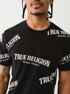 Keep it cool and classic in the True Religion Logo Print Tee. Crafted from soft cotton knit, this men’s T-shirt features a crew neck and short sleeves. Finished with an allover True Religion logo print.  Style: 700029 Kids Denim, Dark Wash Denim, True Religion, Short Shirts, Mens Denim, Jeans For Sale, S Models, Printed Tees, Infant Tees