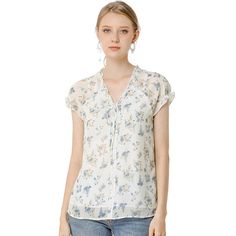 Lightweight and breezy, the shirt is perfect for sunshine styling. A floral print updates this top, perfect for adding a summer pattern to warm-weather looks. Made of a lightweight fabric, the printed style has a self-tie decor at the neckline and a ruffled trim. It has a loose fit that falls to the hip, so you can easily tuck it into skirts or jeans. Summer V-neck Blouse With Ditsy Floral Print, Breezy Summer Blouse With Ruffles, Summer Breezy Blouse With Ruffles, Breezy Ruffled Tops For Summer, Summer Breezy Ruffled Tops, Breezy Summer Tops With Ruffles, Flowy Breezy Tops For Daywear, Casual Floral Print Summer Tops, Flowy Short Sleeve Breezy Top