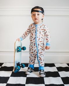 Make bedtime and playtime even more fun with this Skate of Mind Dream Romper! Made of soft bamboo material, this long sleeve romper features a playful skateboard theme, keeping you cool and comfy for hours of fun. So take a ride and hit the hay in style! Made from the softest and most breathable bamboo viscose material, your babe won't want to take this off! Designed for all the love and extra snuggles! Sleep and play with zero irritation with our tag-less garment tags! Can't miss our fold over Tuxedo Accessories, Toddler Flower Girls, Girls Gloves, Girls Dress Outfits, Toddler Flower Girl Dresses, Infant Flower Girl Dress, Bamboo Material, Tea Party Dress