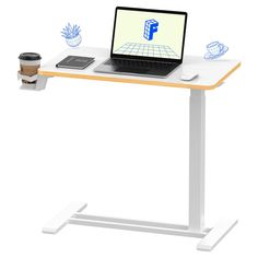 an open laptop computer sitting on top of a white and wooden desk with coffee cup next to it