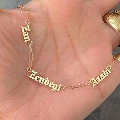 This meaningful necklace stating in Farsi "Woman Life Freedom" is made in support of the current Iranian movement for human rights. This nameplate cut-out necklace is composed entirely of 14K solid gold and beautifully complemented by a durable 14K solid gold chain small size paperclip chain. English Transliteration: Zan Zendegi Azadi Dimensions: approximately 7mm (L) to 11mm (L) Chain Width: approximately 2mm Pendant Thickness: approximately 1mm Metal Finish: High Shine Polish This design is av Customizable Luxury Yellow Gold Necklaces, Customizable Rose Gold Pendant Jewelry, Elegant Customizable Gold Plated Necklaces, Elegant Customizable Gold-plated Jewelry, Elegant Customizable Gold Plated Jewelry, Customizable White Gold Nameplate Jewelry, Luxury Customizable Nameplate Necklaces, Luxury 14k Gold Customizable Necklace, Customized Yellow Gold Luxury Necklace