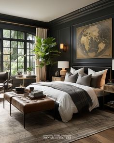 a bedroom with black walls and white bedding, large window, chair, footstool, ottoman and painting on the wall