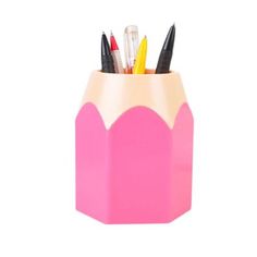 a pink pencil holder with pens and markers in it on a white background for use as a pen holder