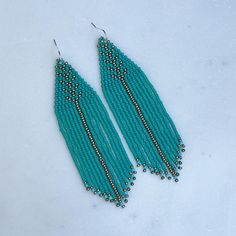 Turquoise and Silver Beaded Fringe Earrings, Blue/green Bohemian Beaded Tassel Earrings - Etsy Blue Bohemian Beaded Fringe Tassel Earrings, Turquoise Beaded Tassel Earrings For Summer, Summer Turquoise Beaded Tassel Earrings, Blue Southwestern Beaded Fringe Earrings, Southwestern Blue Beaded Fringe Earrings, Bohemian Turquoise Tassel Earrings, Turquoise Beaded Fringe Tassel Earrings For Festival, Turquoise Beaded Fringe Tassel Earrings For Summer, Turquoise Tassel Earrings With Colorful Beads For Festival